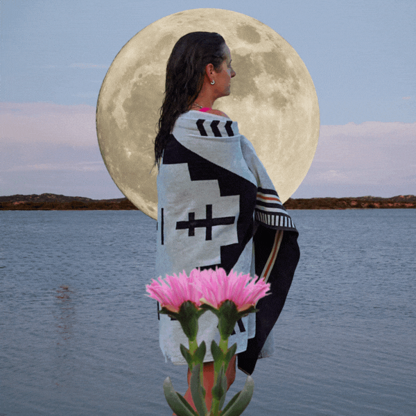 This is a collage of images its a person in a towel that Kate Brooks owner of Coorong life and then the full behind her is made into a super moon for affect and a Pigface flower is in the front