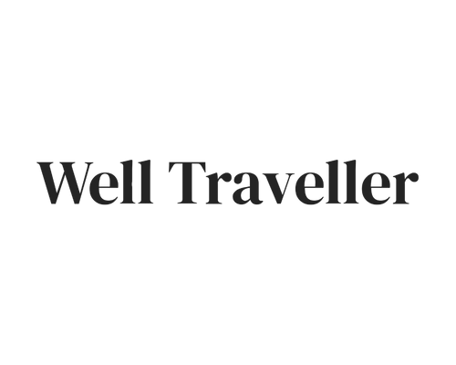 Text 'Well Traveller' on a green background